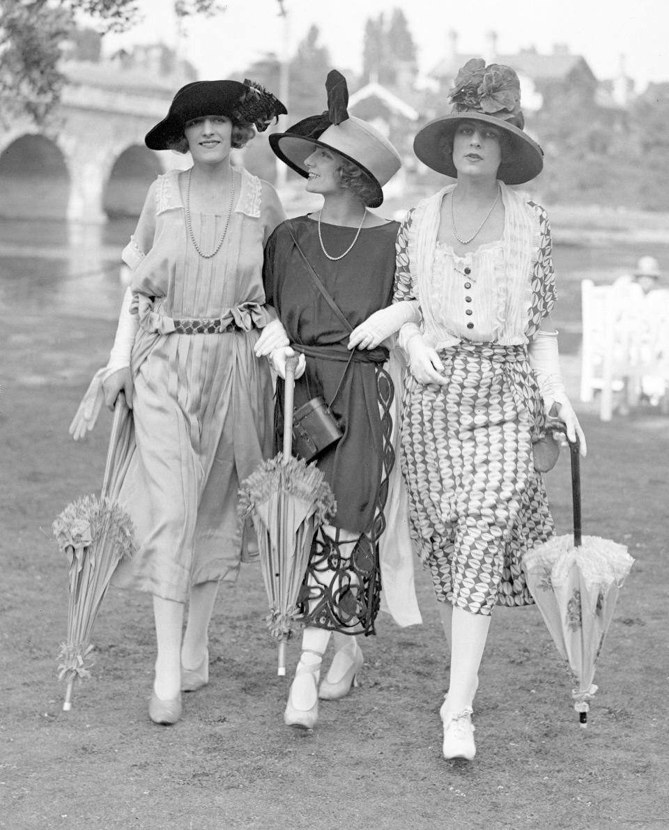 Female race-goers photographed at the annual event in 1921 [Photo: Getty]