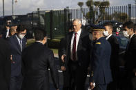 Israeli Defence Minister Benny Gantz, center, is welcomed by Morocco's Foreign Minister Nasser Bourita, in Rabat, Morocco, Wednesday, Nov. 24, 2021. Israel and Morocco signed a landmark agreement Wednesday that lays the foundation for security cooperation, intelligence sharing, and future arms sales. (AP Photo/Mosa'ab Elshamy)