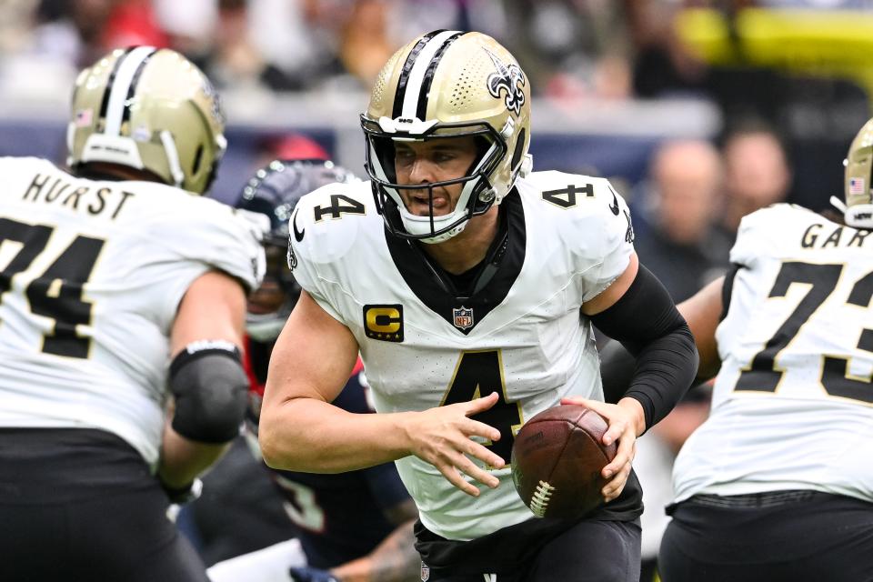 Oct 15, 2023; Houston, Texas, USA; New Orleans Saints quarterback Derek Carr (4) in action during the second quarter against the Houston Texans at NRG Stadium. Mandatory Credit: Maria Lysaker-USA TODAY Sports