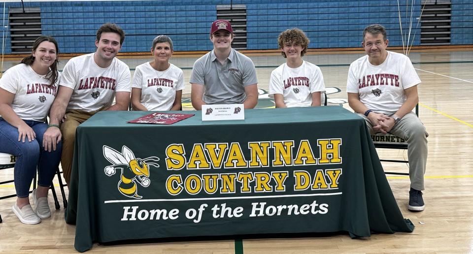 Dalton Brown of Savannah Country Day, pictured with his family, signed to play baseball at Lafayette College Thursday.