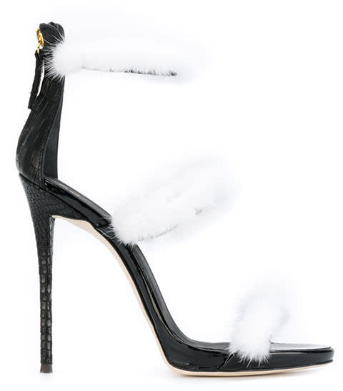 <p><strong>Giuseppe Zanotti </strong>sandals, $1,150, farfetch.com</p><p><a rel="nofollow noopener" href="https://www.farfetch.com/shopping/women/giuseppe-zanotti-design-harmony-winter-sandals-item-12220163.aspx?" target="_blank" data-ylk="slk:BUY NOW;elm:context_link;itc:0;sec:content-canvas" class="link ">BUY NOW</a><br></p>
