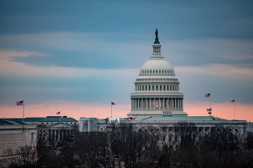 The sun sets over the US Capitol during the Senate impeachment trial of President Donald Trump on January 27. Source: Getty