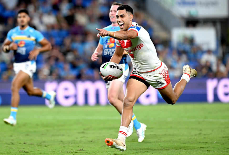 GOLD COAST, AUSTRALIA - MARCH 09: Tyrell Sloan of the Dragons celebrates after scoring a try during the round one NRL match between the Gold Coast Titans and St George Illawarra Dragons at Cbus Super Stadium, on March 09, 2024, in Gold Coast, Australia. (Photo by Bradley Kanaris/Getty Images)