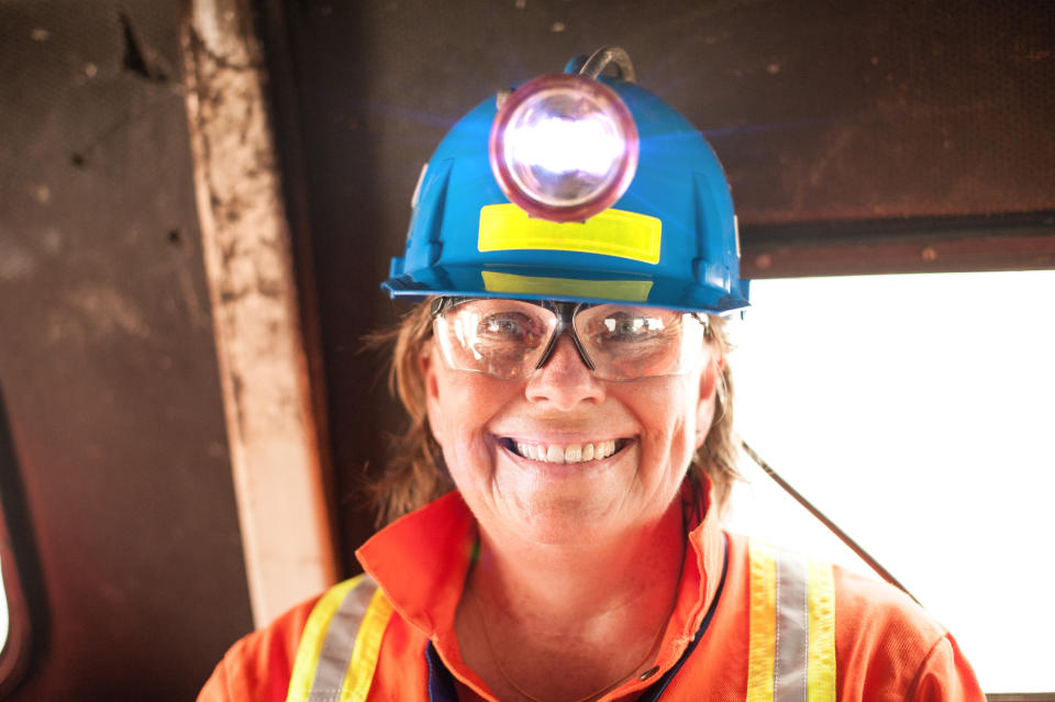 21_05_18 A person in protective gear including a helmet mine light  _GettyImages-536832347