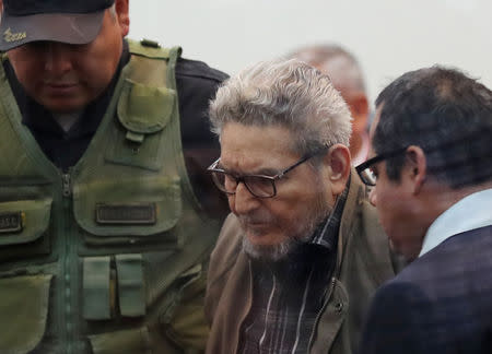 Shining Path founder Abimael Guzman attends a trial during sentence of a 1992 Shining Path car bomb case in Miraflores, at a high security naval prison in Callao, Peru September 11, 2018. REUTERS/Mariana Bazo