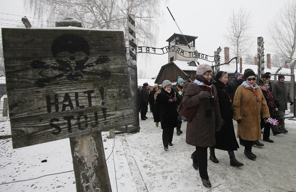 Holocaust survivors arrive for a ceremony to mark the 69th anniversary of the liberation of Auschwitz Nazi death camp's in Oswiecim, Poland, on Monday, Jan. 27, 2014, since the Soviet Red Army liberated the camp. Israeli lawmakers and government officials are to attend anniversary observances later in the day. The Nazis killed some 1.5 million people, mostly Jews at the camp during World War II. (AP Photo/Czarek Sokolowski)