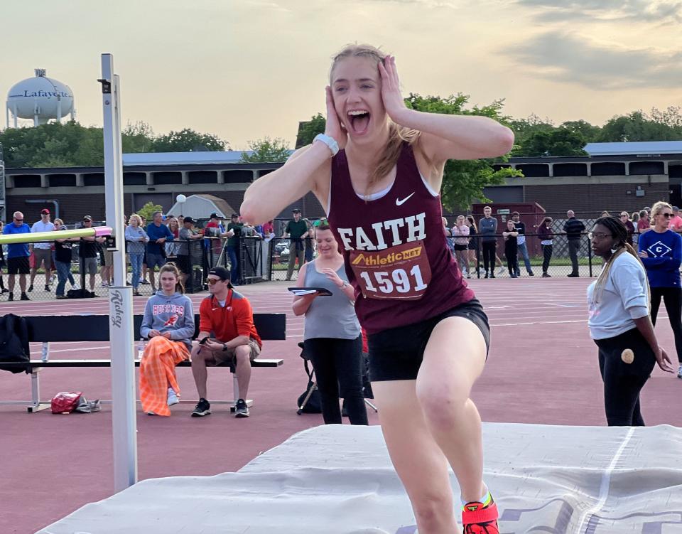 Faith Christian's Alli Holder reacts to clearing 5-4 on high jump at the Lafayette Jeff Regional on May 24, 2022, qualifying her for the state meet.