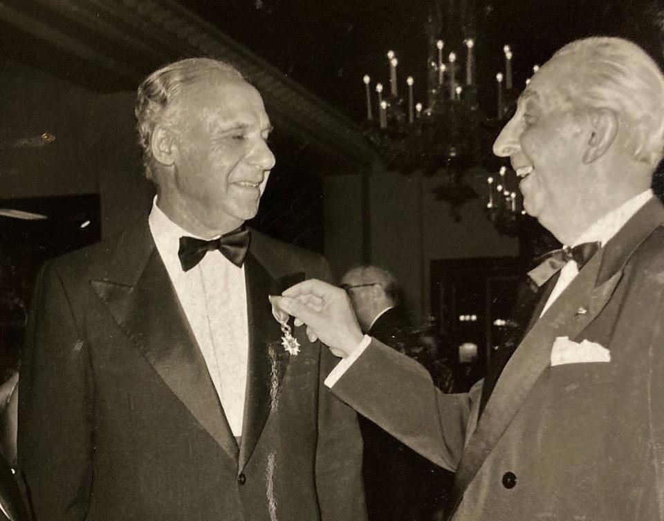 Dr. Robert Greenblatt, of Augusta, is congratulated by Professor Michel Albeaux-Fernet, after receiving the French Legion of Honor in 1973.