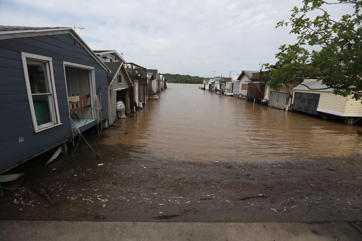 Canandaigua Lake was full of debris that piled up along the City Pier.