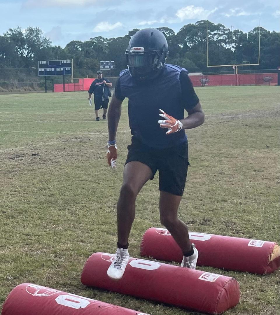 St. Lucie West Centennial rising senior edge rusher Brooks Williams runs drills during practice on Tuesday. Williams is committed to USF.