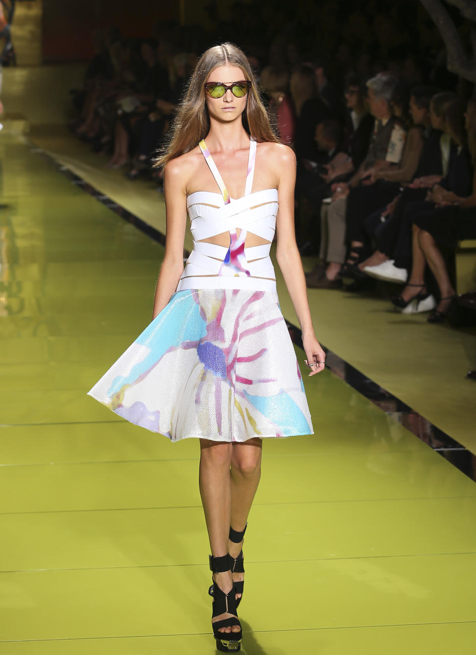 A model wears a creation for Versace's women's Spring-Summer 2014 collection, part of the Milan Fashion Week, unveiled in Milan, Italy, Friday, Sept. 20, 2013. (AP Photo/Antonio Calanni)