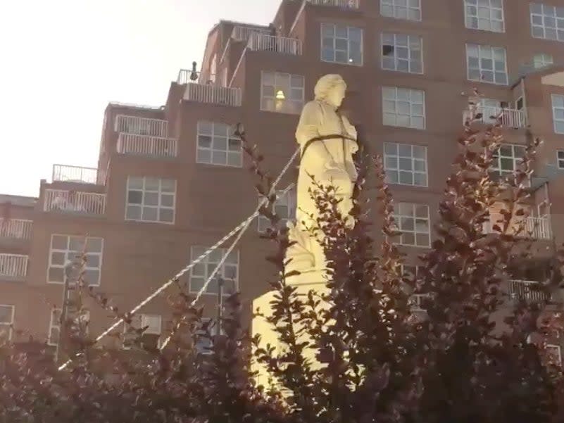 Protesters pull down the statue of Christopher Columbus in Baltimore: SPENCER COMPTON via REUTERS