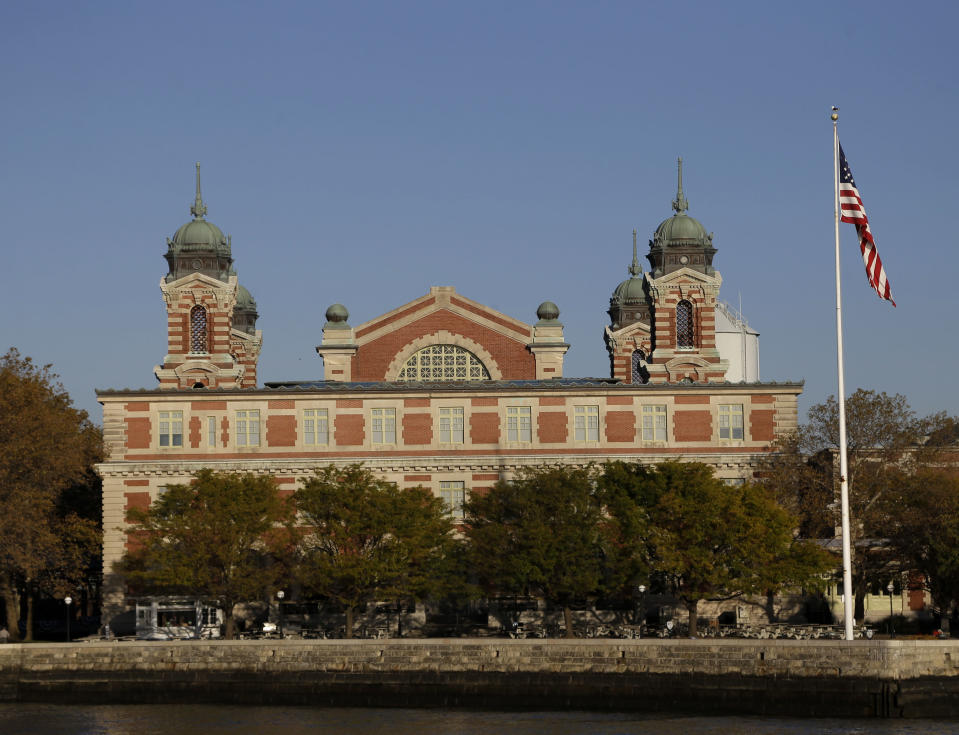 The Ellis Island Immigration Museum is seen on Ellis Island in New York, Monday, Oct. 28, 2013. The island that ushered millions of immigrants into the United States received visitors Monday for the first time since Superstorm Sandy. Sandy swamped boilers and electrical systems and left the 27.5-acre island without power for months. (AP Photo/Seth Wenig)