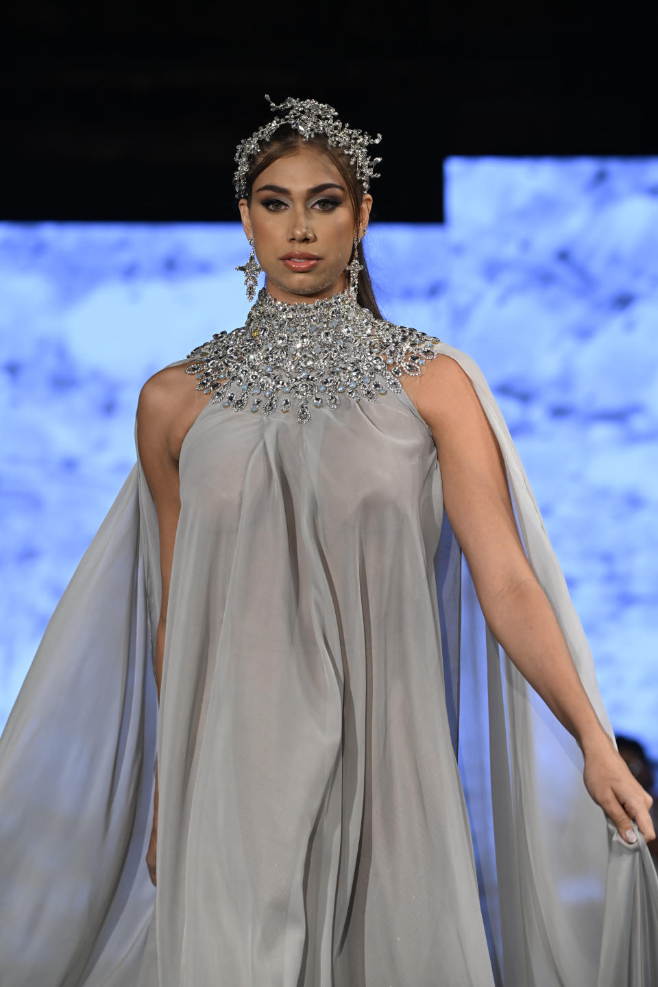 Lina Luaces on the runway using a design by Giannina Azar.  (Photo by Arun Nevader/Getty Images for Art Hearts Fashion)