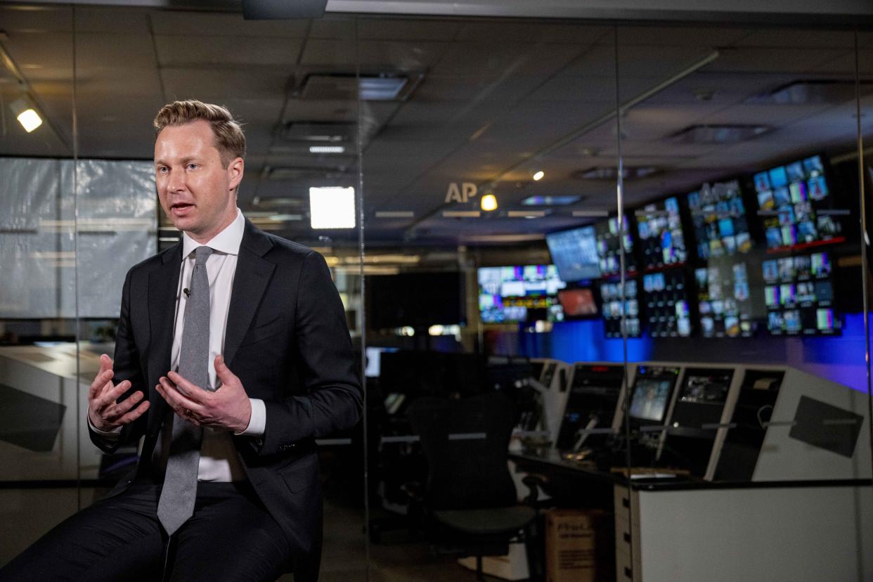 Andrew Adams, director of the Justice Department's KleptoCapture task force, designed to enforce the economic restrictions imposed on Russia and its billionaires, speaks to the Associated Press in an interview at the AP bureau in Washington, Wednesday, March 1, 2023. (AP Photo/Andrew Harnik)