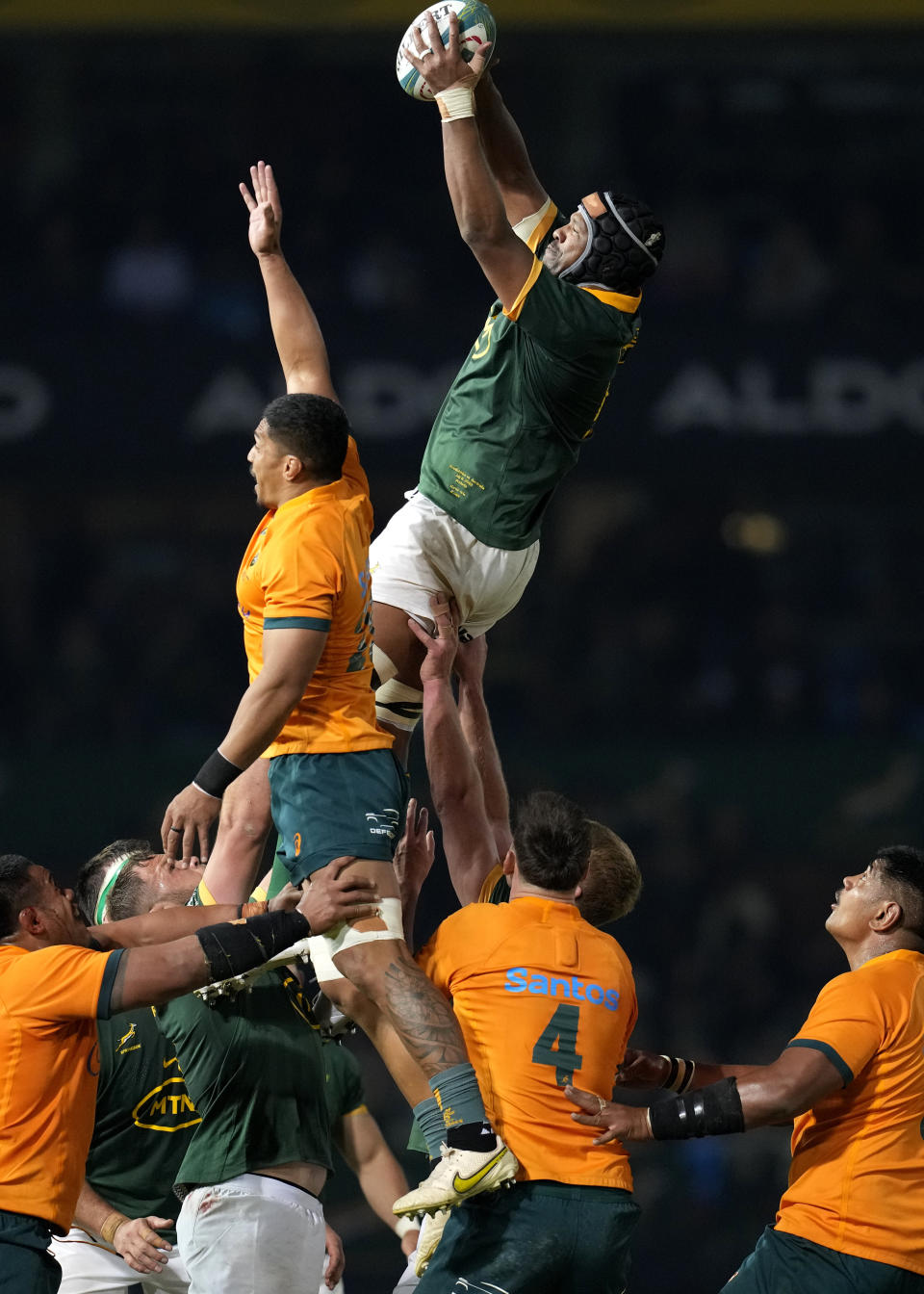 South Africa's Marvin Orie, top right, wins a line out throw against Australia's David Porecki during the Rugby Championship test match between South Africa and Australia at Loftus Versfeld stadium in Pretoria, South Africa, Saturday, July 8, 2023. (AP Photo/Themba Hadebe)