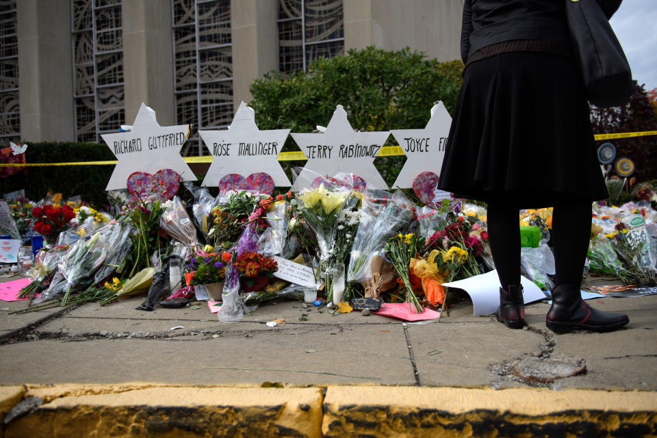 Mourners visit the memorial outside the Tree of Life Synagogue on Oct. 31, 2018 in Pittsburgh, Pennsylvania. (Photo: Jeff Swensen via Getty Images)