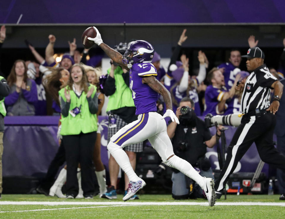 Vikings WR Stefon Diggs celebrates his 61-yard game-winning touchdown against the Saints in the playoffs. (AP)