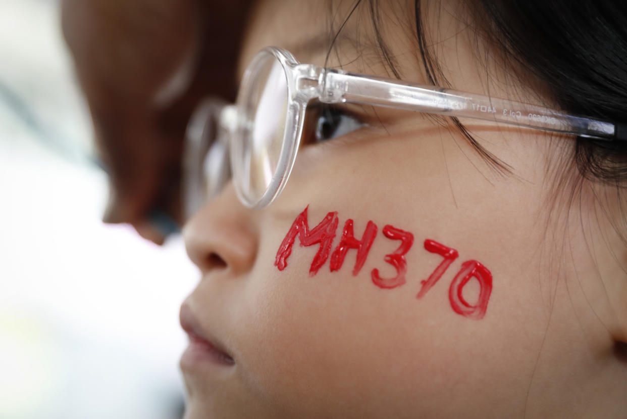 An independent investigation report released more than four years after Malaysia Airlines Flight MH370 disappeared found that highjacking could not be ruled out. (AP Photo/Vincent Thian)