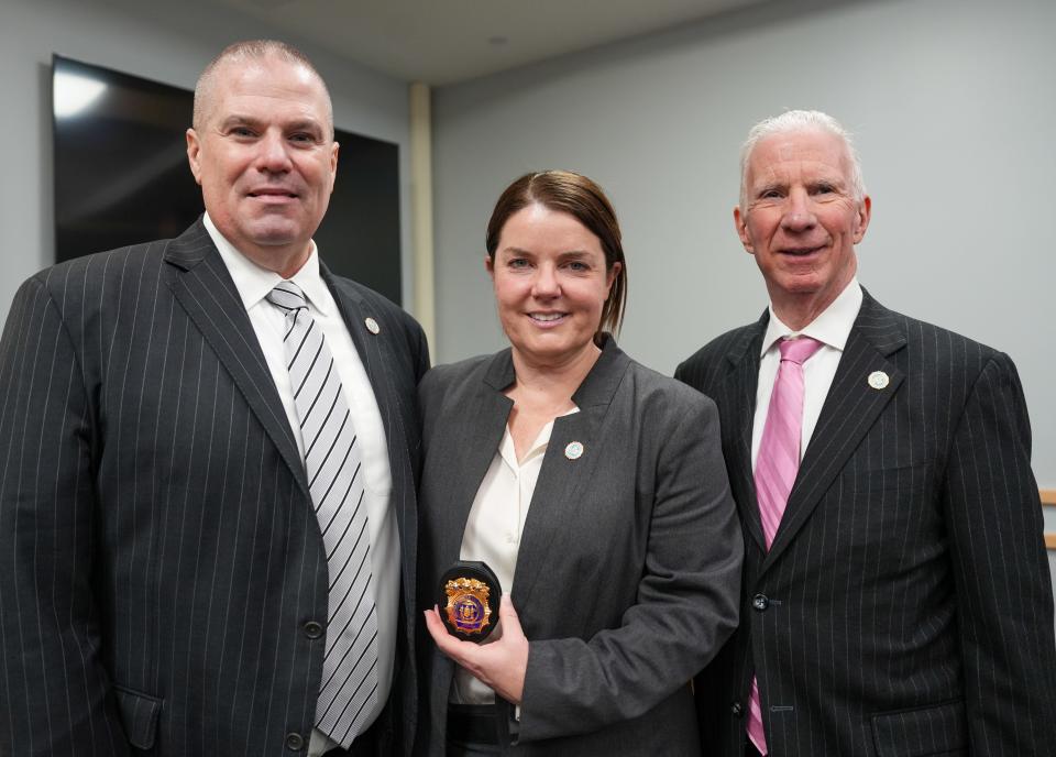 Dierdre Smith stands between First Assistant District Attorney Patrick Frawley, left, and Rockland District Attorney Thomas Walsh after being sworn in as chief of detectives on March 1, 2024