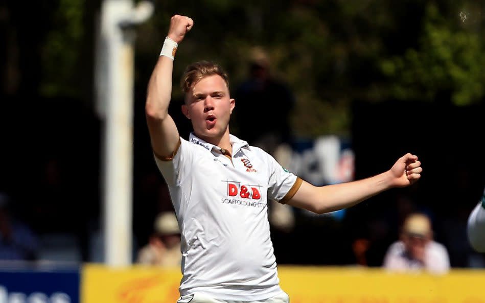 Sam Cook celebrates a wicket