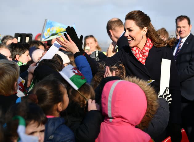 Kate Middleton high fives children as she leaves the RNLI Mumbles Lifeboat Station on February 04, 2020 near Swansea, South Wales. 