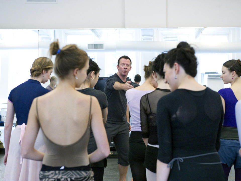 This undated photo provided by the American Ballet Theatre shows Alexei Ratmansky in rehearsal for Igor Stravinsky's "Firebird" with the American Ballet Theatre corps de ballet in New York. Ratmansky, one of the most acclaimed choreographers in the world, is stepping down from his perch at American Ballet Theatre, the company announced on Thursday, Dec. 22, 2022. (Gene Schiavone/American Ballet Theatre via AP)