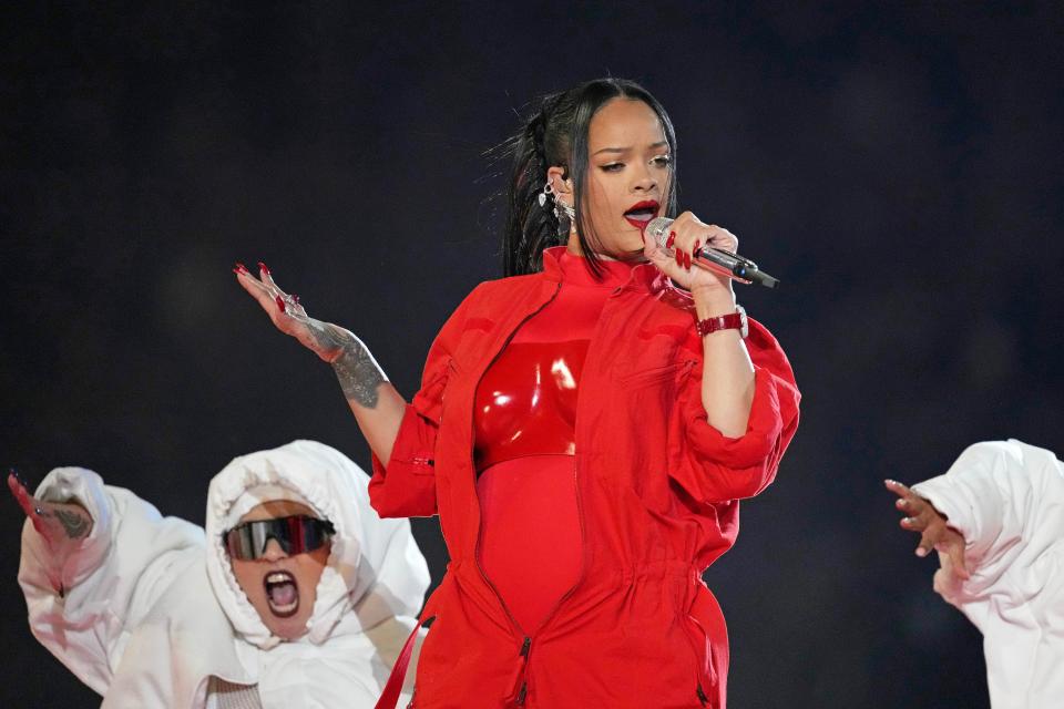 Rihanna performs during halftime of Super Bowl 57.