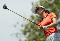 Michelle Wie watches her drive off the second tee in the final round of the LPGA LOTTE Championship golf tournament at Ko Olina Golf Club, Saturday, April 19, 2014, in Kapolei, Hawaii. (AP Photo/Eugene Tanner)