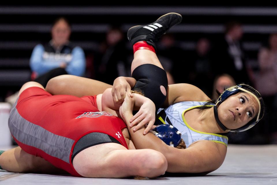 Westlake’s Keilikki nau Rarick and Mountain Ridge’s Hannah Whitlock compete in the 6A Girls Wrestling State Championships at the UCCU Center in Orem on Thursday, Feb. 15, 2024. | Marielle Scott, Deseret News