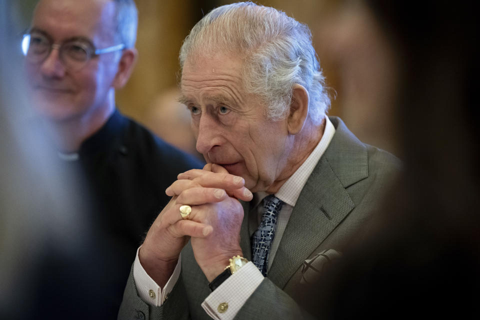 FILE - Britain's King Charles III hosts a gathering of young UK community and faith leaders to discuss the challenges their communities face, at Buckingham Palace, in London, Dec. 13, 2023. King Charles III has been diagnosed with a form of cancer and has begun treatment, Buckingham Palace says on Monday, Feb. 5, 2024. (Aaron Chown/Pool Photo via AP, File)