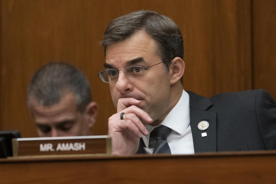 FILE - In this June 12, 2019 file photo, Rep. Justin Amash, R-Mich., listens to debate as the House Oversight and Reform Committee considers whether to hold Attorney General William Barr and Commerce Secretary Wilbur Ross in contempt for failing to turn over subpoenaed documents related to the Trump administration's decision to add a citizenship question to the 2020 census, on Capitol Hill in Washington. Amash, the only Republican in Congress to support the impeachment of President Donald Trump, said Thursday, July 3 he is leaving the GOP because he has become disenchanted with partisan politics and "frightened by what I see from it." (AP Photo/J. Scott Applewhite, File )