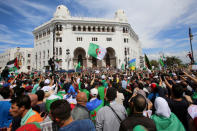 Demonstrators carry national flags and banners during an anti-government protest in Algiers, Algeria May 17, 2019. REUTERS/Ramzi Boudina