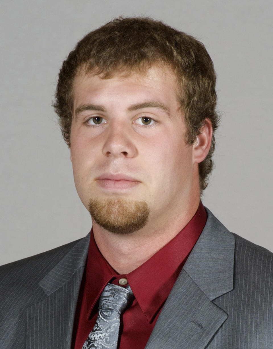 <p>In this undated photo, provided by Southern Illinois University, Jason Seaman, a defensive end for the SIU football team, poses for a photo in Carbondale, Ill. Seaman, now a science teacher at Noblesville West Middle School in Noblesville, Ind., subdued a student armed with two handguns who opened fire inside his classroom Friday, May, 25, 2018. (Photo: Southern Illinois University via AP) </p>
