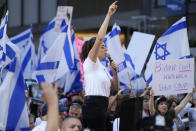 Protesters wave flags and chant slogans near the site of a planned meeting between United States President Joe Biden and Israeli Prime Minister Benjamin Netanyahu in New York, Wednesday, Sept. 20, 2023. (AP Photo/Seth Wenig)