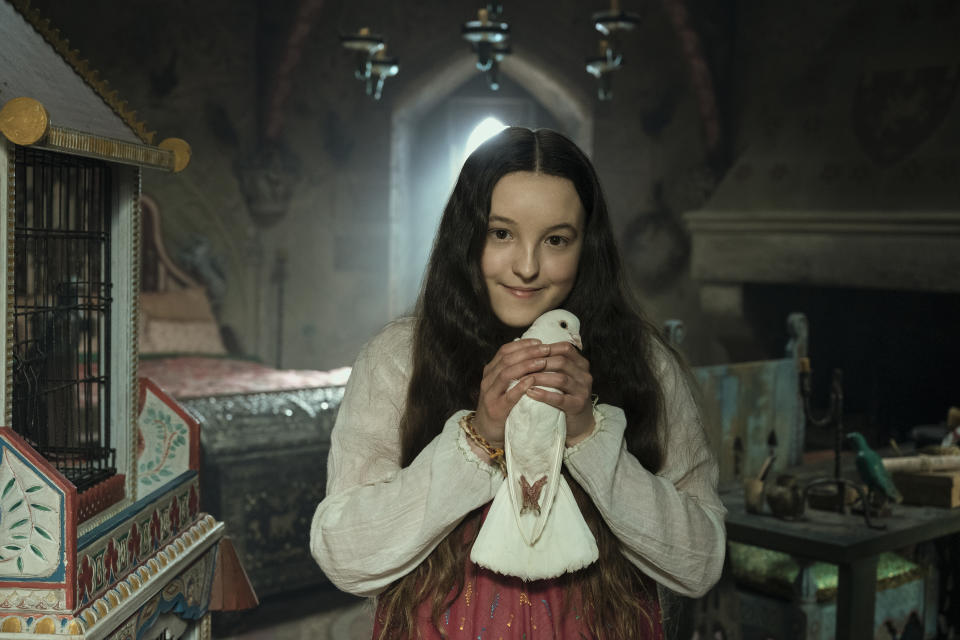 This image released by Amazon shows Bella Ramsey in a scene from "Catherine Called Birdy." (Alex Bailey/Amazon via AP)