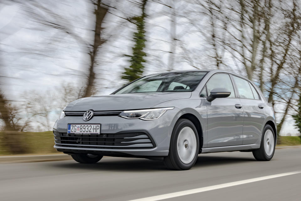 Zagreb, Croatia - March 9, 2020: Man is driving new Volkswagen Golf fast on a country road. The 8th generation of iconic VW model is based on updated version of the MQB platform.