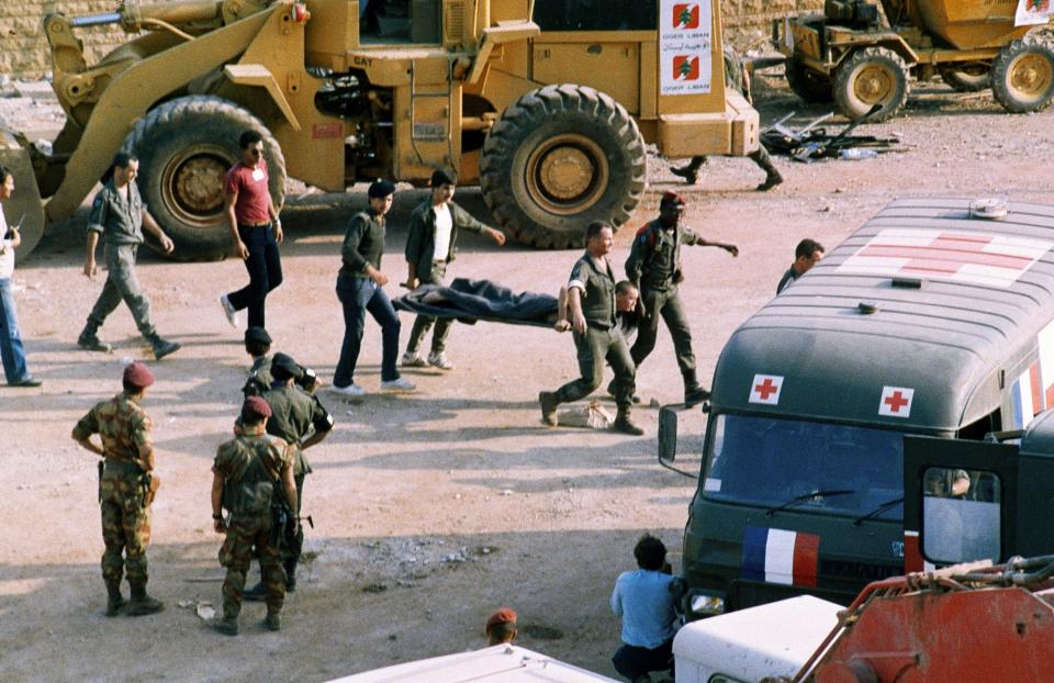 FILE - An Oct. 23, 1983, file photo, shows the scene at the U.S. Marine base near Beirut airport, Lebanon, following a suicide truck blast that destroyed the base and caused a huge death toll.