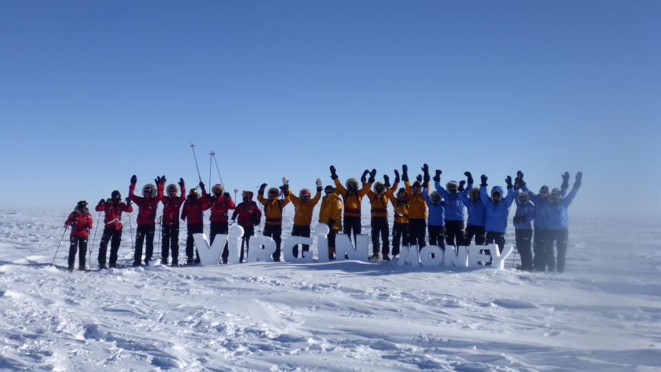 Teams pose for a picture on the first day of the Virgin Money South Pole Allied Challenge 2013 expedition in Antarctica