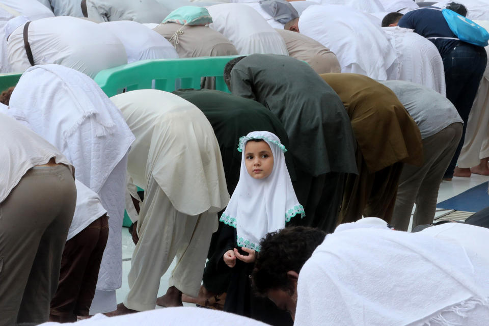 Pilgrims pray at the Grand Mosque