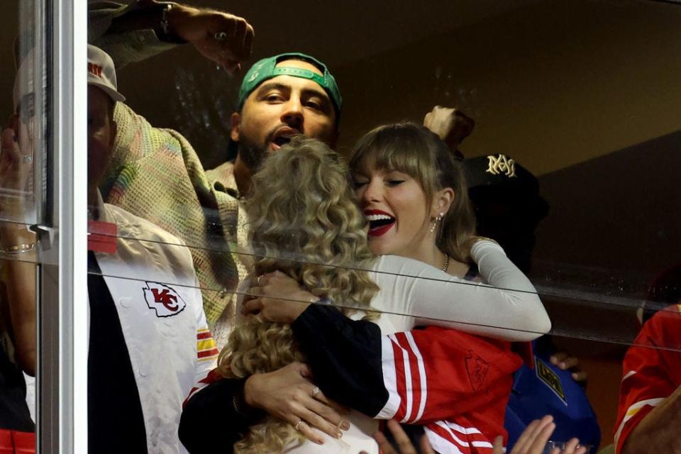 Brittany Mahomes and Taylor Swift celebrate a touchdown by the Kansas City Chiefs