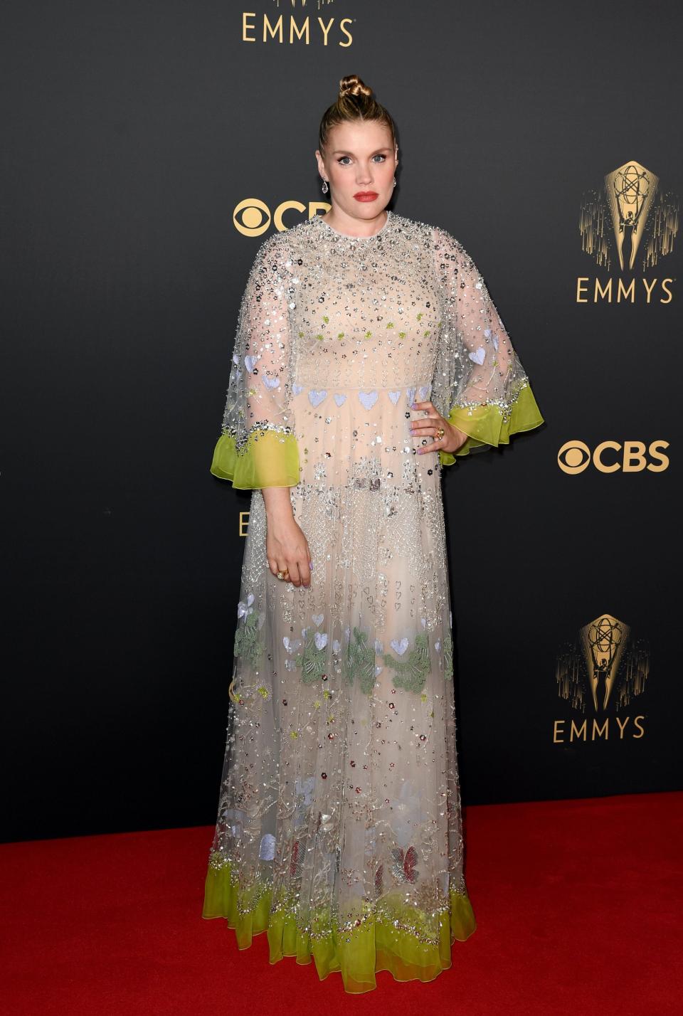 Emerald Fennell wears a sparkly, cream dress on the Emmys red carpet.
