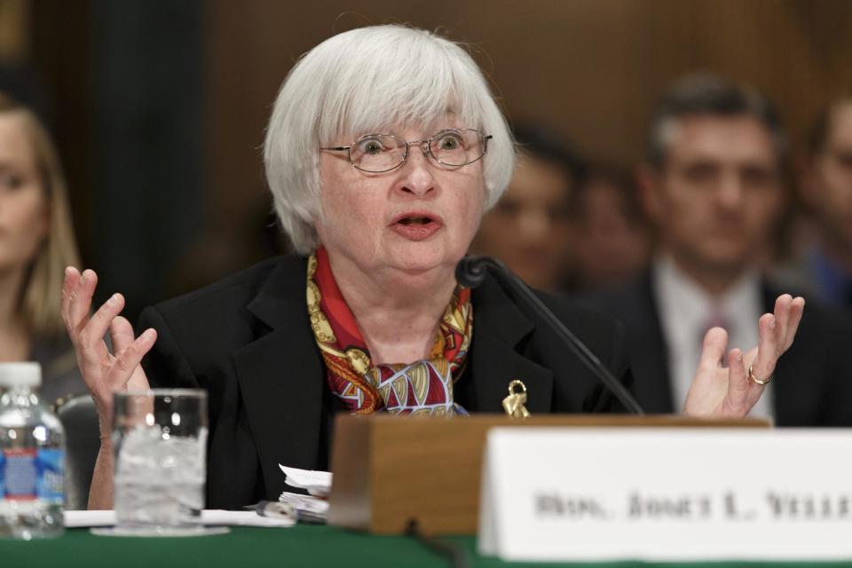 Federal Reserve Chair Janet Yellen testifies on Capitol Hill in Washington, Thursday, Feb. 27, 2014, before the Senate Banking Committee to deliver the semiannual Monetary Policy Report to Congress. Yellen noted that some recent economic data have pointed to weaker-than-expected gains in consumer spending and job growth. She said the Fed will be watching to see whether the slowdown proves only a temporary blip caused by severe winter weather. (AP Photo/J. Scott Applewhite)