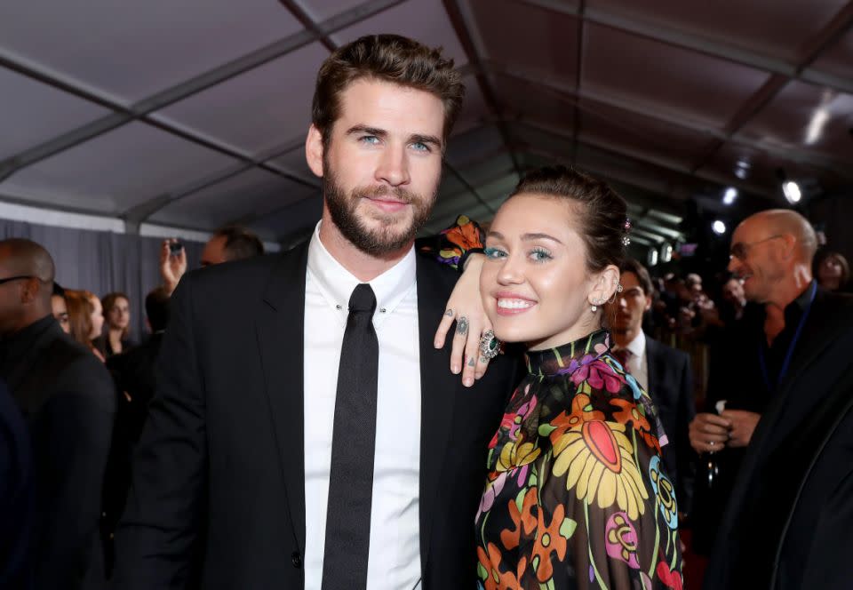 Actor Liam Hemsworth (L) and Miley Cyrus at The World Premiere of Marvel Studios' 