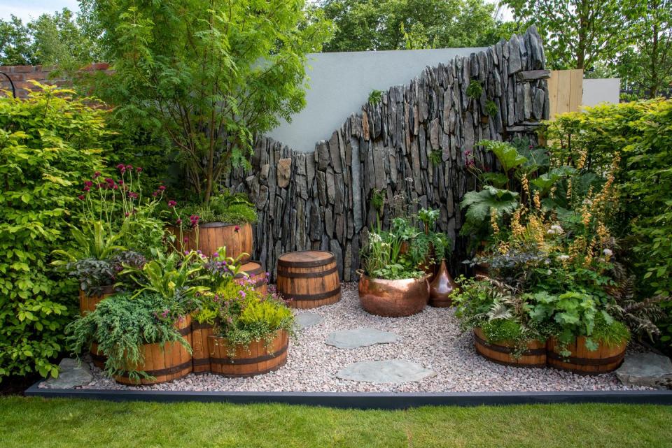 <p><strong>CONTAINER GARDEN | Award: GOLD</strong></p><p>Inspired by Scotland and the plants that thrive across the Highlands and Islands, this garden celebrates reuse, repurposing and heritage crafts. Reclaimed Scottish whisky casks are reconstructed to make new sculptural planters, whilst slate rescued from a disused quarry in Perthshire is constructed to resemble a glen between two mountains.</p>