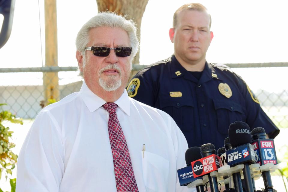 Venice Municipal Airport Administrator Mark Cervasio, left, addresses the media at a Monday morning press conference to discuss details of a Saturday night plane crash. At right is Venice Police Capt. Eric Hill, who is the commander of the department’s criminal investigations division.