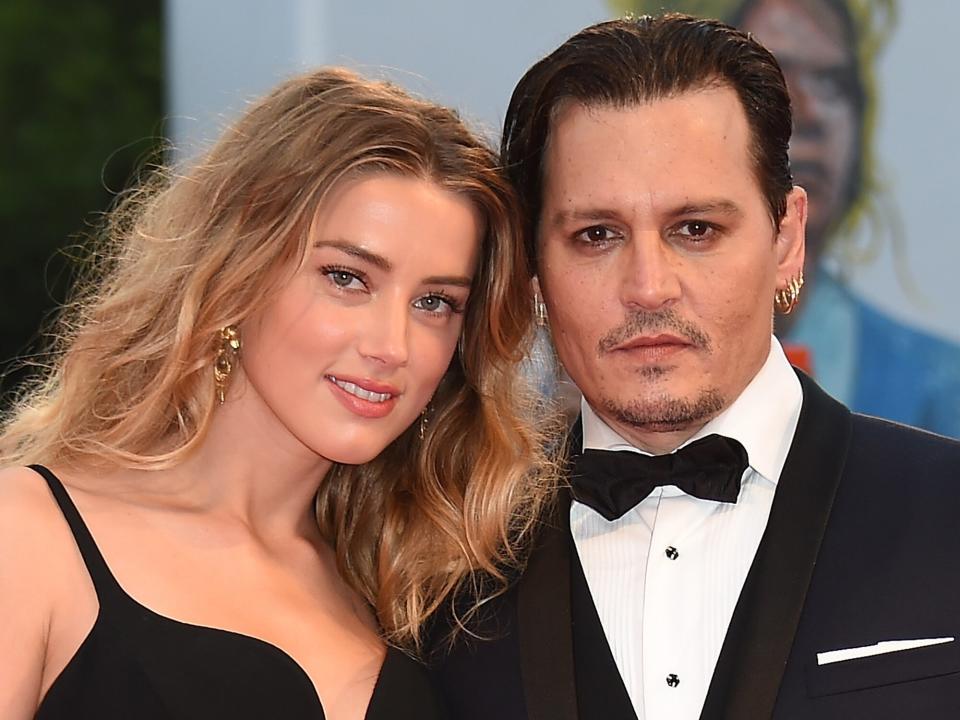 Johnny Depp and Amber Heard attend a premiere for 'Black Mass' during the 72nd Venice Film Festival at on September 4, 2015 in Venice, Italy