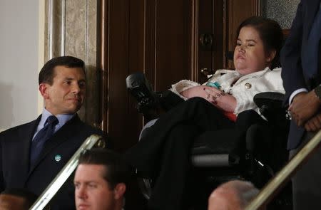 U.S. President Donald Trump addresses Joint Session of Congress - Washington, U.S. - 28/02/17 - Megan Crowley listens as U.S. President Donald Trump addresses the U.S. Congress. REUTERS/Jonathan Ernst