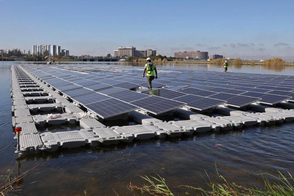 Solar array floats out as FPL and Miami-Dade County launched a half-acre 402-panel floating solar array generating 160 kilowatts of power into the Blue Lagoon adjacent to Miami International Airport on Tuesday, January 28, 2020.