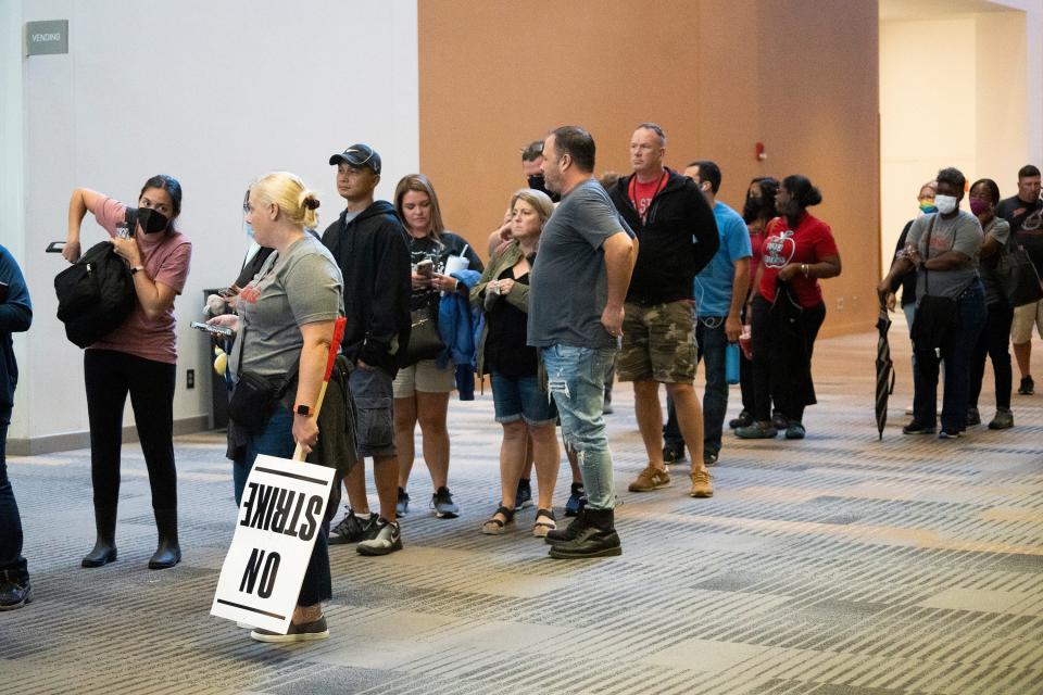 Aug 21, 2022; Columbus, Ohio, USA; Columbus Education Association members file into the convention center to vote on whether or not to go on strike.